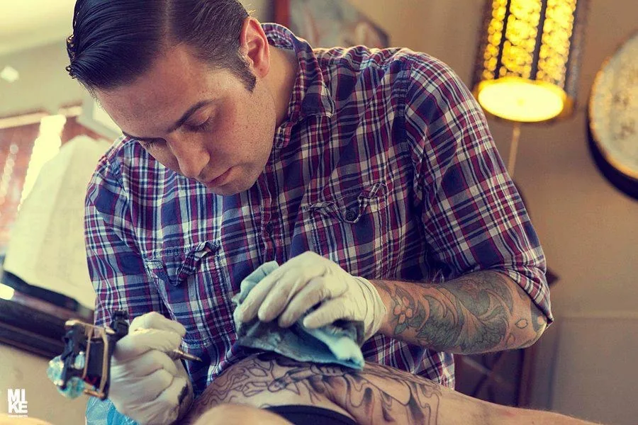 Terry Ribera custom tattoo artist working, San Diego