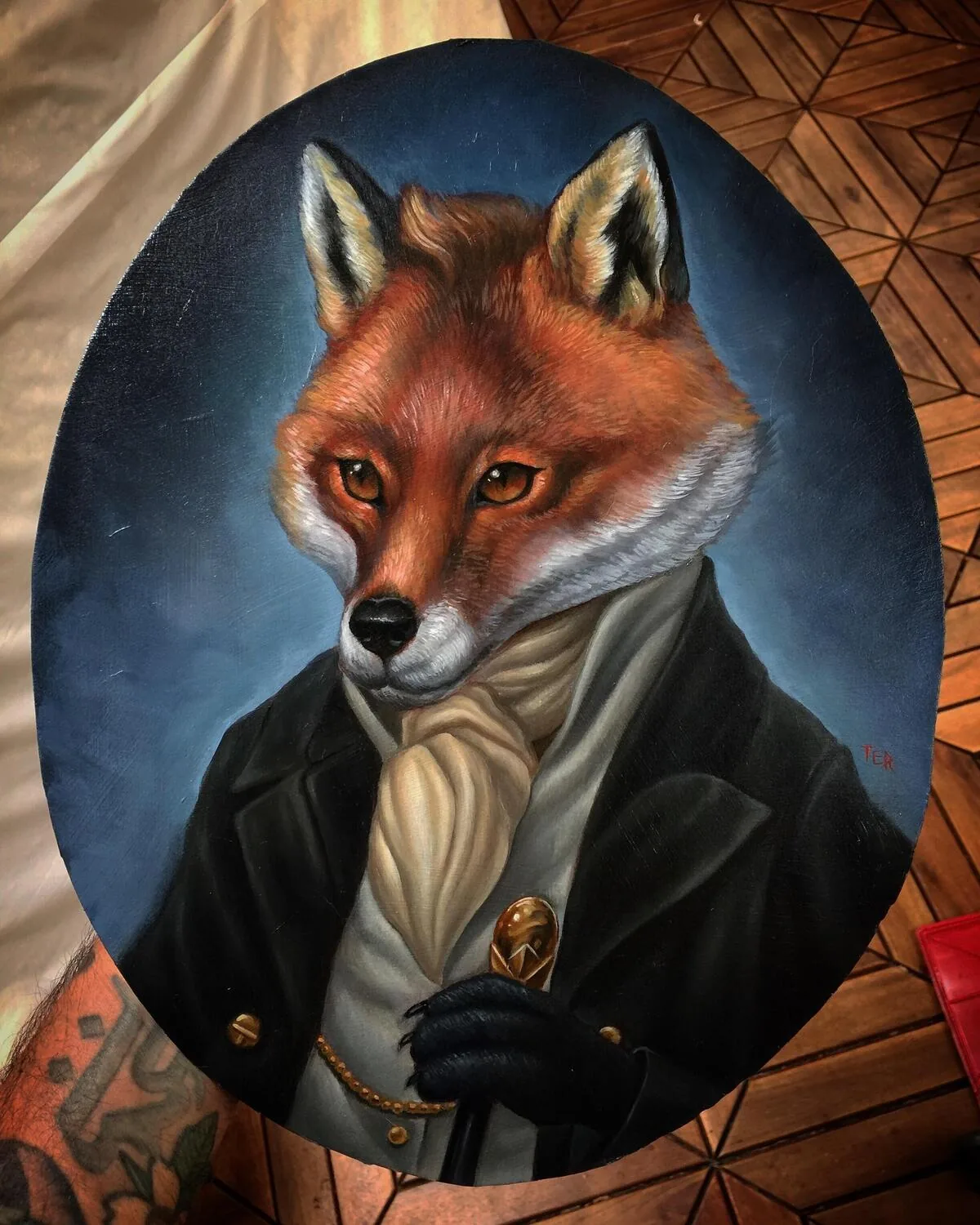 Custom pet portrait oil painting of a red fox dressed as a Victorian gentleman in black coat with ivory cravat and cane in an oval frame, by Terry Ribera San Diego