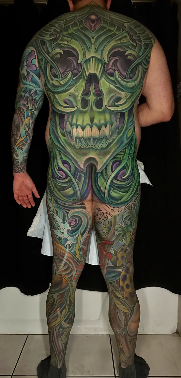 Illustrative bio-organic green skull body suit by Terry Ribera, San Diego