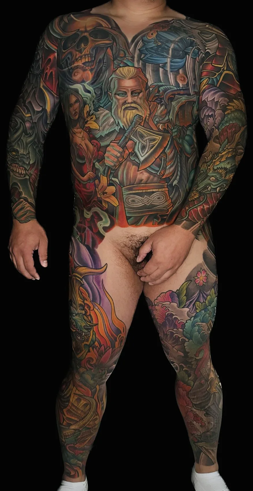 Fantasy illustrative bodysuit tattoo, full front view showing chest, both sleeves and both legs completed by Terry Ribera at Remington Tattoo in San Diego.