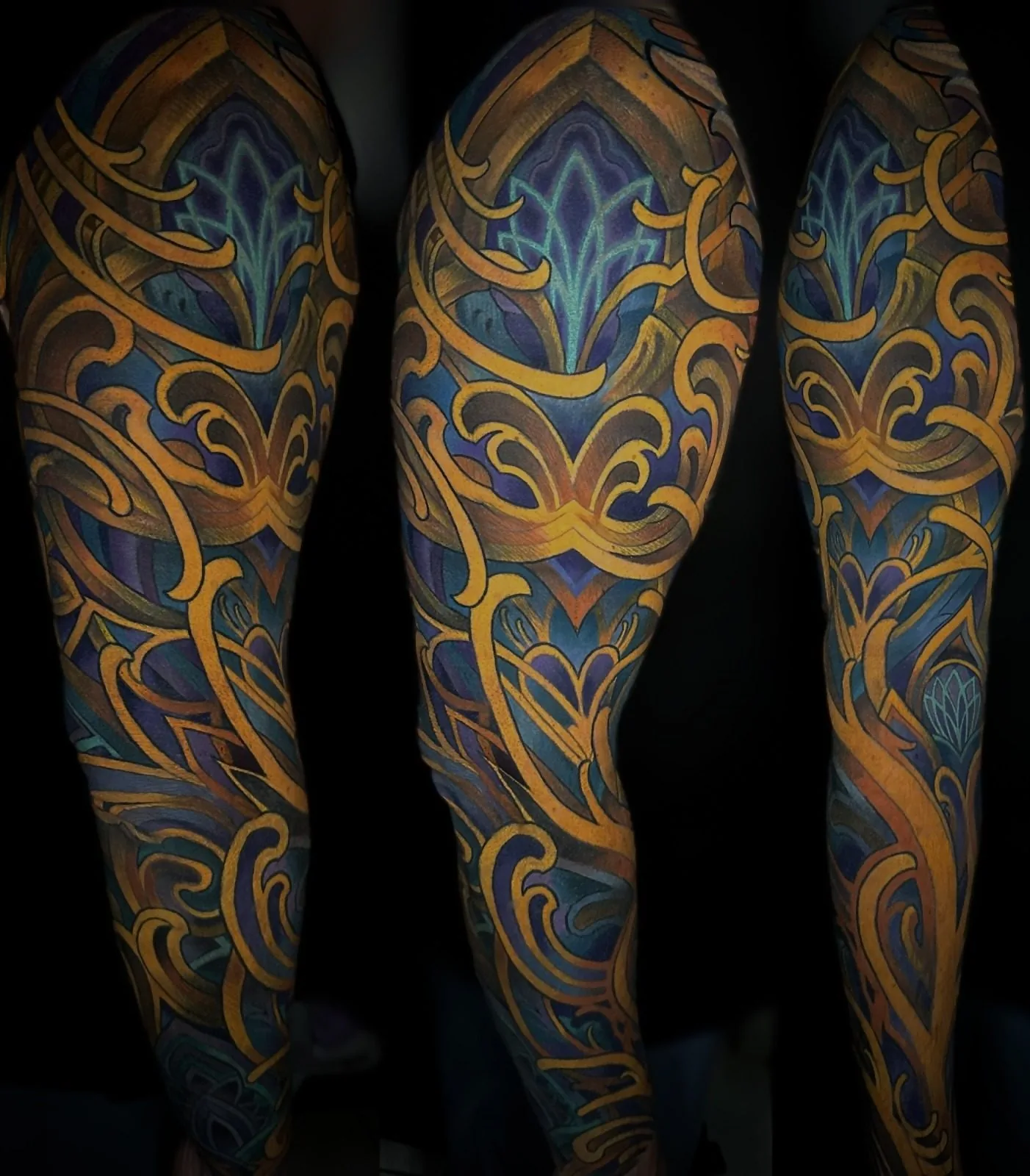 Ornamental Art Nouveau arm sleeve tattoo in gold and deep blue with flowing filigree and a lotus motif, shown from three angles by Terry Ribera at Remington Tattoo in San Diego.