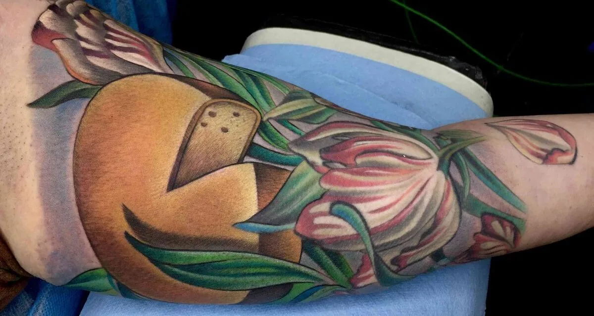 Neo Traditional mushroom tulip forearm tattoo by Terry Ribera, San Diego