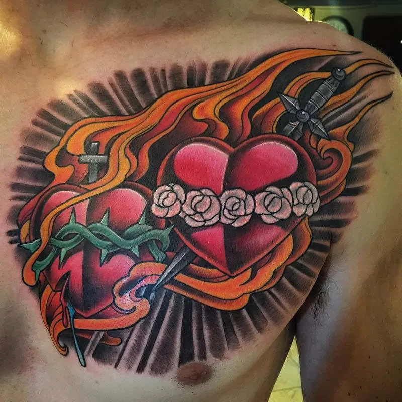 Neo Traditional sacred heart dagger chest tattoo by Terry Ribera, San Diego