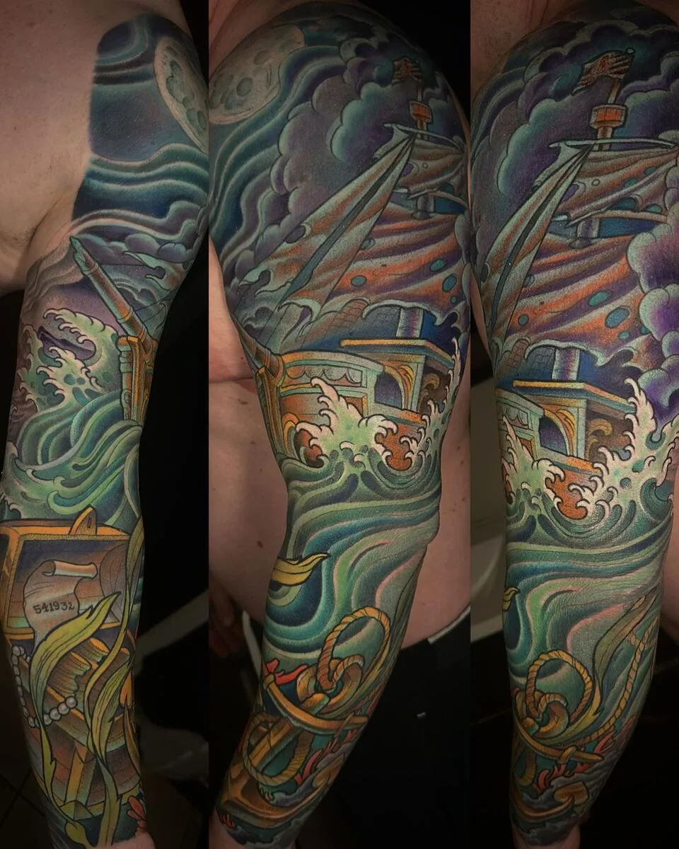 Neo Traditional ship ocean storm sleeve tattoo by Terry Ribera, San Diego