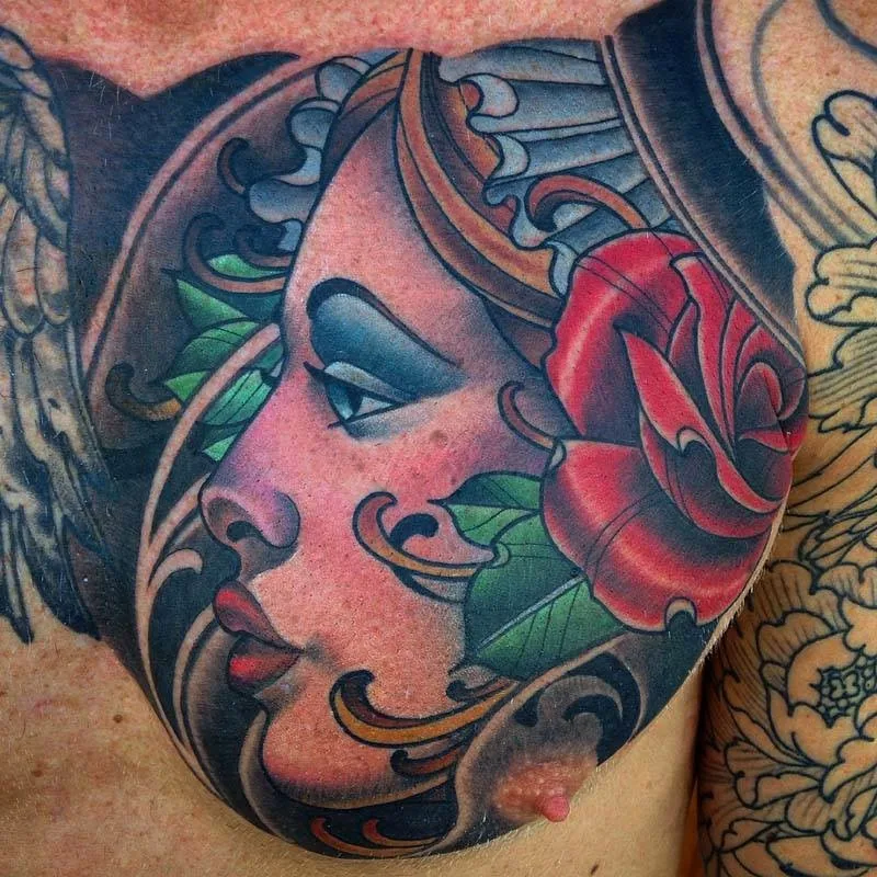 Neo Traditional woman rose chest tattoo by Terry Ribera, San Diego