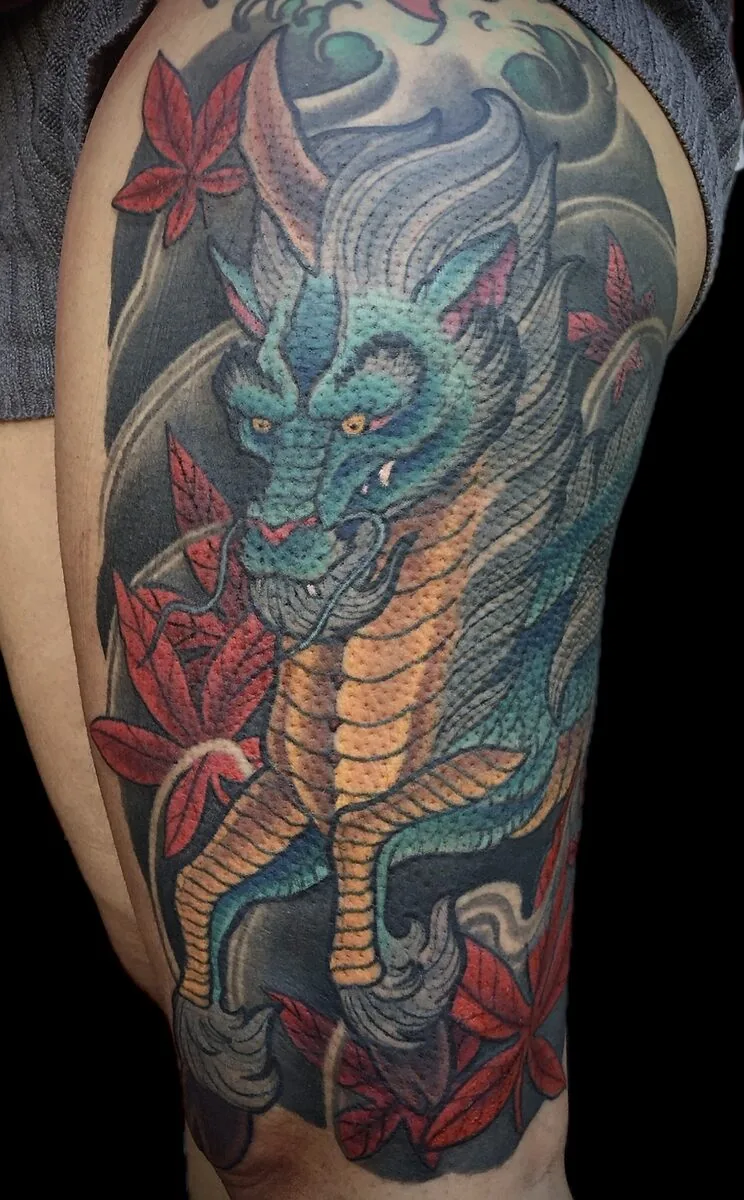 Neo Japanese blue teal dragon red maple leaves thigh tattoo by Terry Ribera, San Diego