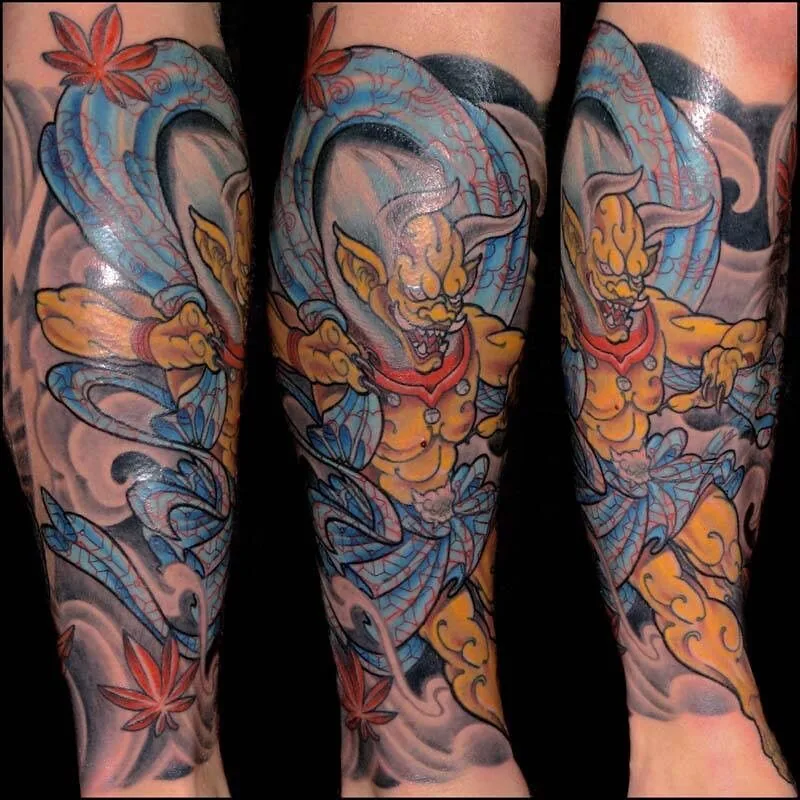 Neo Japanese gold demon blue waves maple leaves calf tattoo by Terry Ribera, San Diego