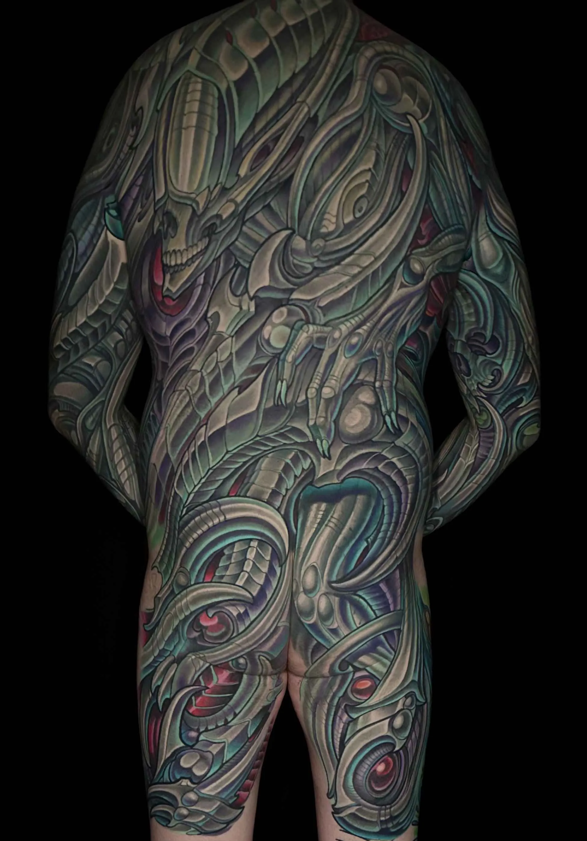 Bio-organic alien back leg bodysuit tattoo by Terry Ribera, San Diego