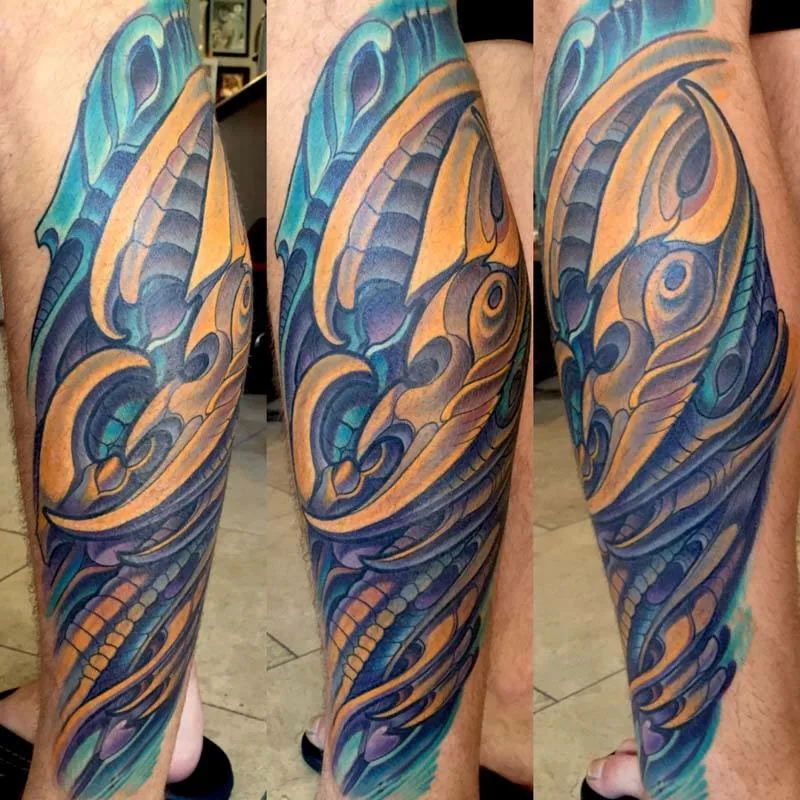 Bio-organic biomechanical calf tattoo by Terry Ribera, San Diego