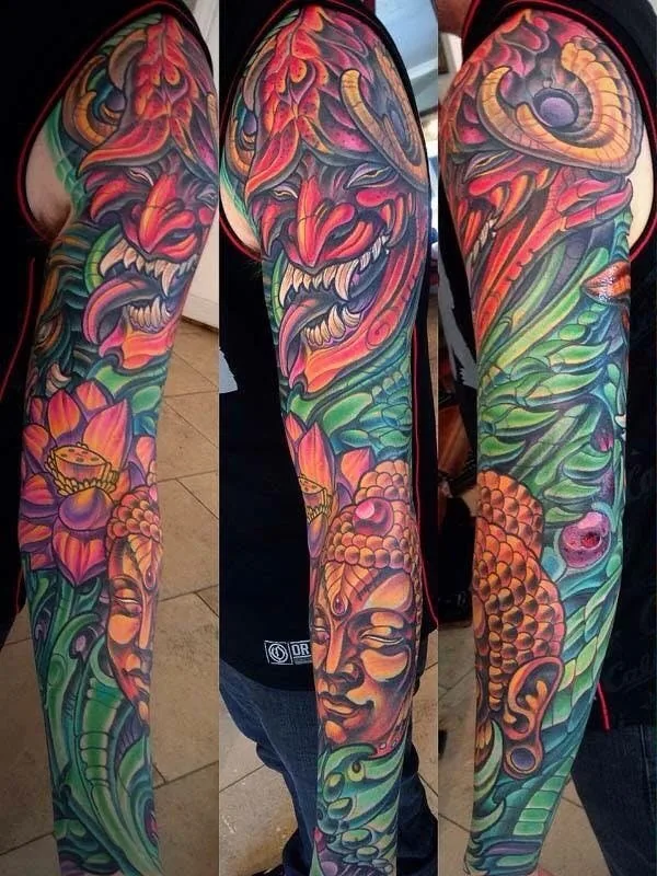 Bio-organic hannya demon Buddha lotus sleeve tattoo by Terry Ribera, San Diego