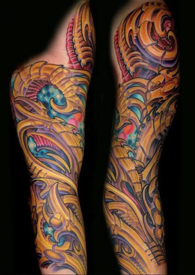 Bio-organic orange yellow colorful full sleeve tattoo by Terry Ribera, San Diego
