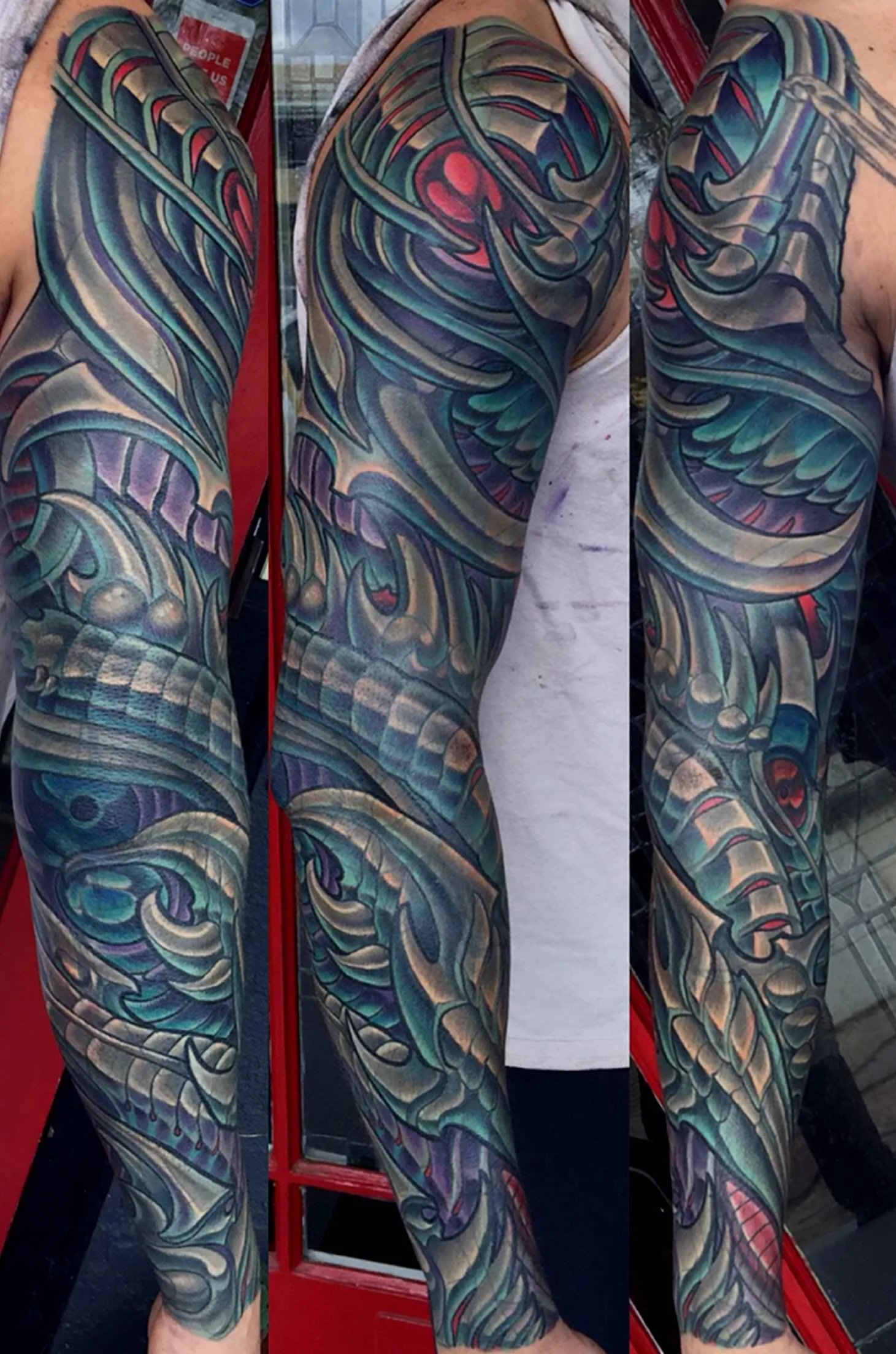 Bio-organic teal blue grey full sleeve tattoo by Terry Ribera, San Diego