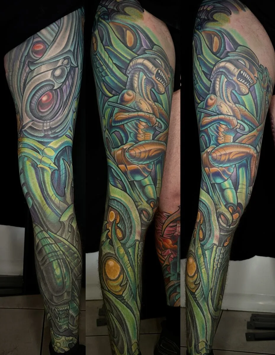 Biomechanical alien bio-organic leg sleeve tattoo by Terry Ribera, San Diego