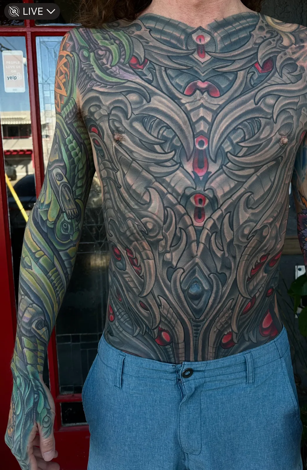 Black and grey biomechanical and bio-organic front torso tattoo by Terry Ribera, San Diego