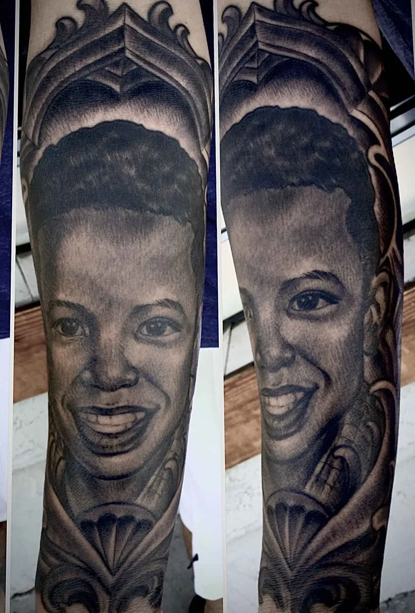 Illustrative black grey woman portrait ornamental forearm tattoo by Terry Ribera San Diego