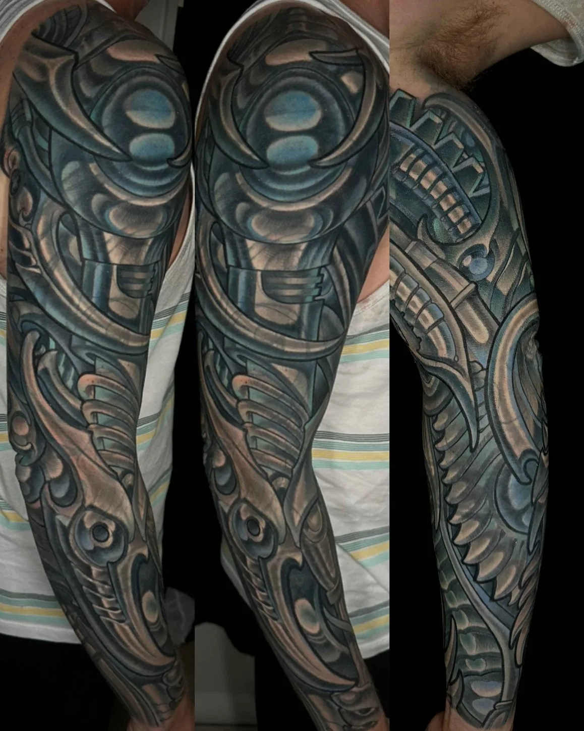 Biomechanical black and grey blue full sleeve tattoo by Terry Ribera at Remington Tattoo, North Park San Diego.