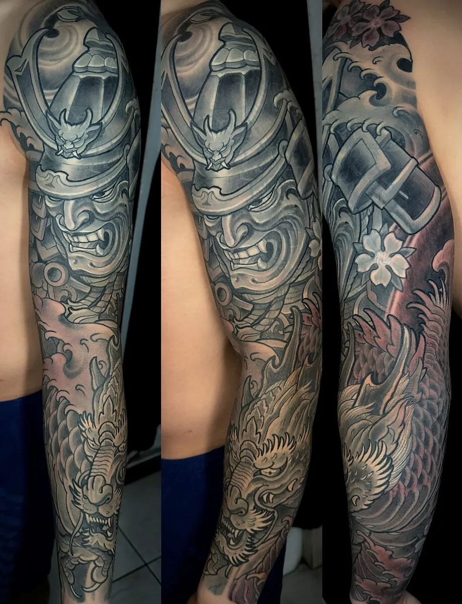 Neo-Japanese samurai helmet and dragon black and grey full sleeve tattoo by Terry Ribera, Remington Tattoo San Diego.