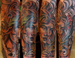 Tattoo Artist Terry Ribera with a Custom Greek Girl Tattoo